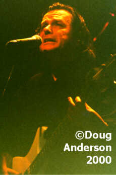 Wetton, looking disturbingly like Lemmy, Robin 1 Feb 2000